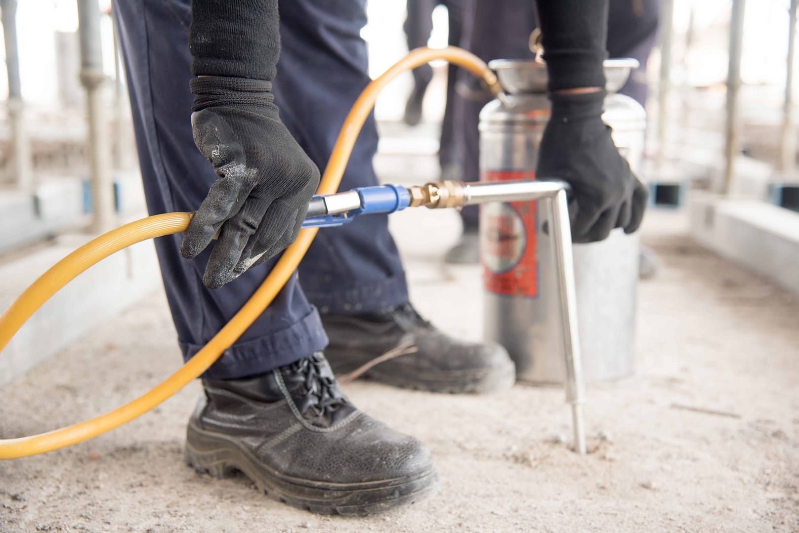 pied piper pest control technician conducting termibec slab injection